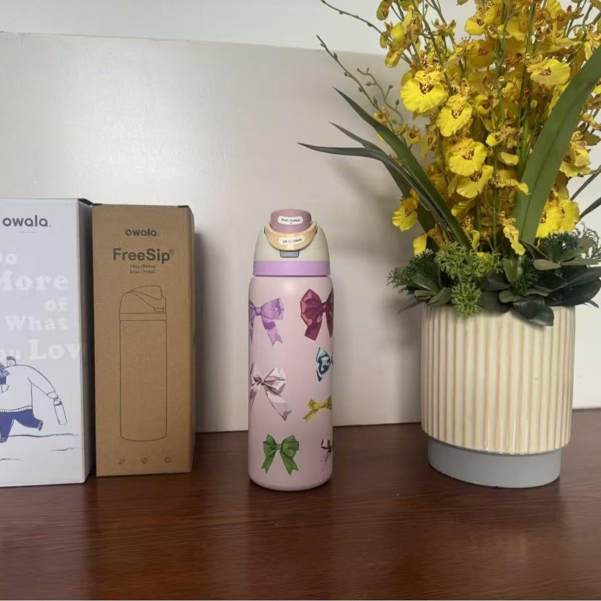 مج أولا حراري مع شفاط – تصميم فيونكات لون وردي فاتح